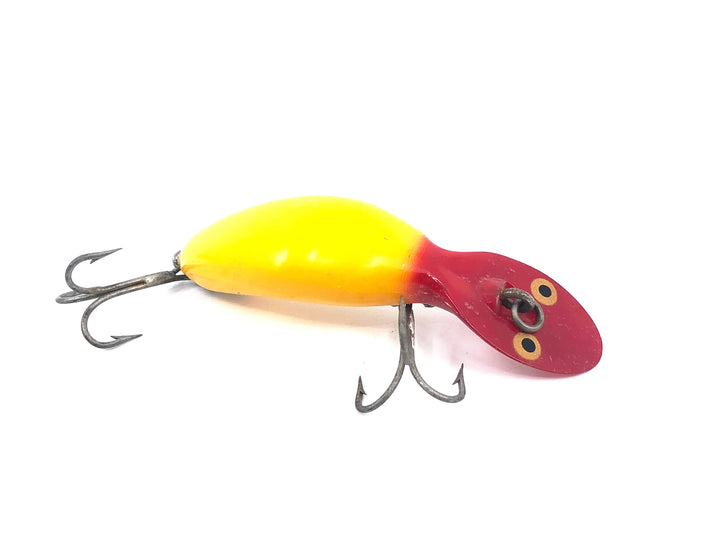 Heddon Tadpolly, YRH Yellow Red Head Color- Older Gold Eyed Model