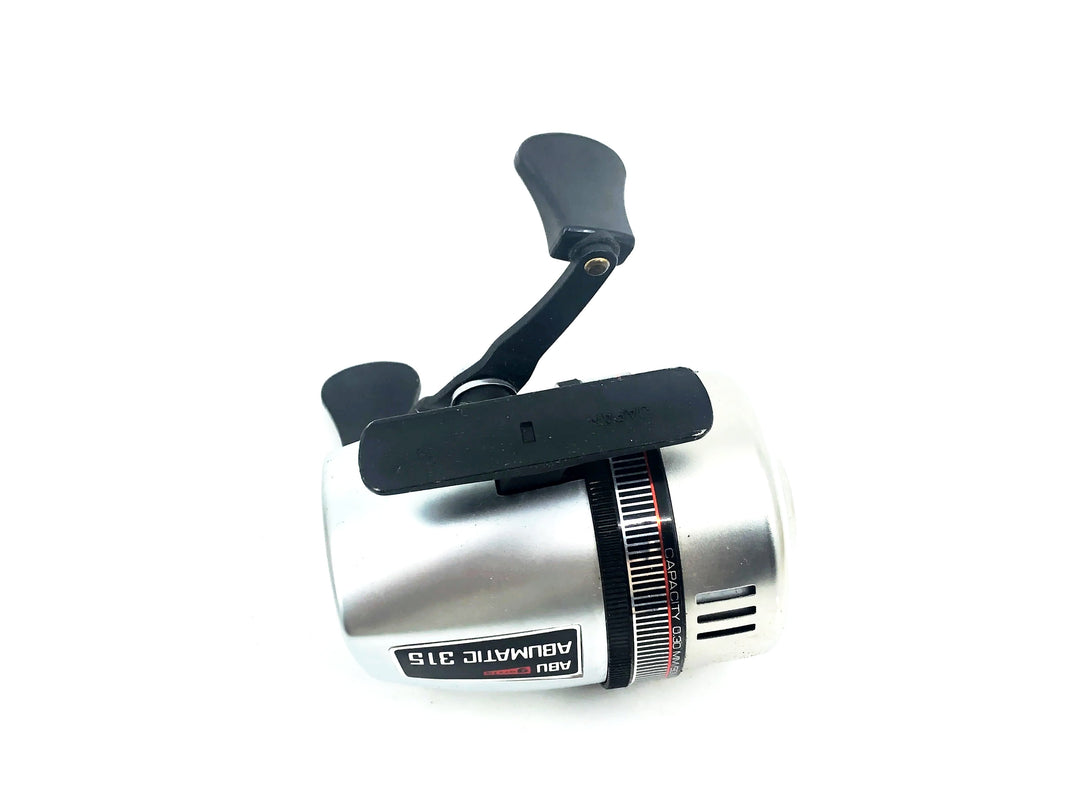 Abu Abumatic 315 Spincast Reel w/Paperwork & Warranty