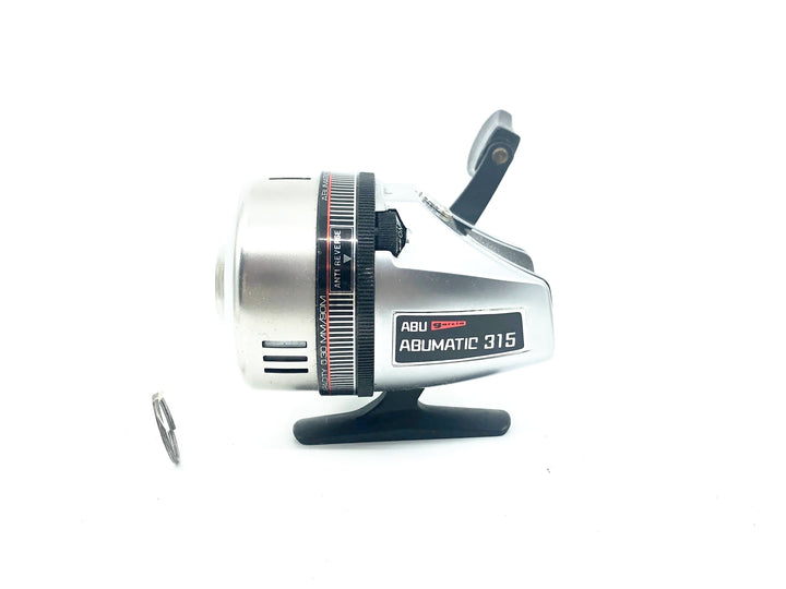 Abu Abumatic 315 Spincast Reel w/Paperwork & Warranty