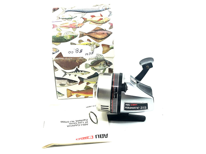 Abu Abumatic 315 Spincast Reel w/Paperwork & Warranty