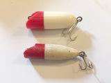 Small Bass Oreno type lures.  Plastic.