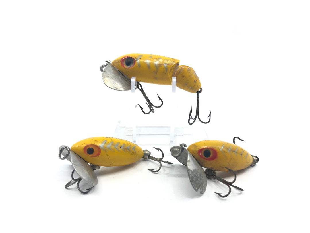 Three Arbogast Jitterbug Silver Stripes and Yellow Color