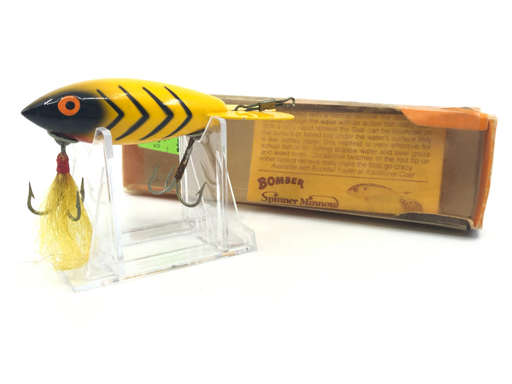 Bomber Bucktail Yellow with Black Ribs