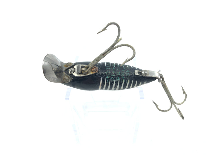 Vintage Heddon River Runt Two Piece Hardware Shrunken Black Shore Color