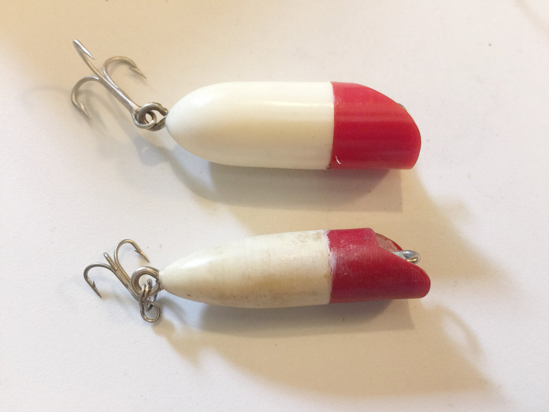 Small Bass Oreno type lures.  Plastic.