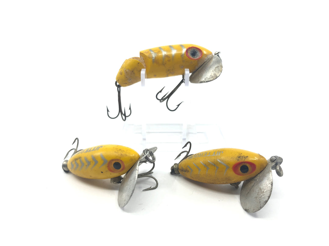 Three Arbogast Jitterbug Silver Stripes and Yellow Color