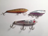Three Lures for fishing.  L & S, Rebel and YoZuri possible